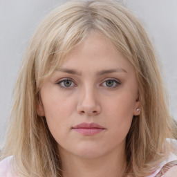 Neutral white young-adult female with medium  brown hair and grey eyes