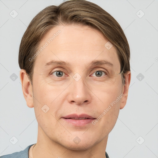 Joyful white adult male with short  brown hair and grey eyes