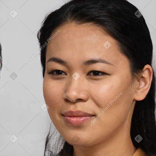 Joyful asian young-adult female with medium  brown hair and brown eyes