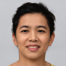 Joyful asian young-adult female with short  brown hair and brown eyes