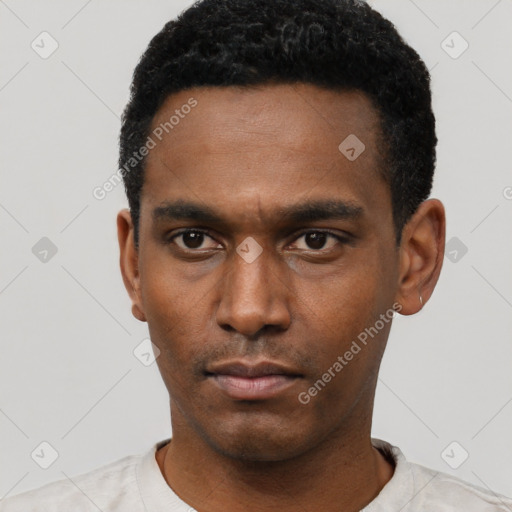 Neutral latino young-adult male with short  black hair and brown eyes