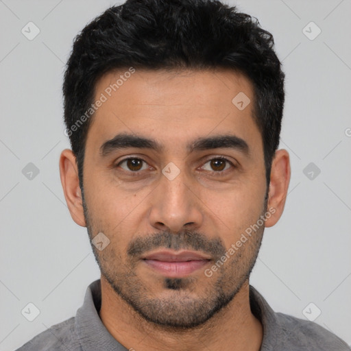 Neutral latino young-adult male with short  black hair and brown eyes
