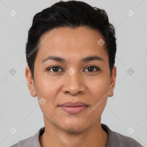 Joyful latino young-adult female with short  black hair and brown eyes