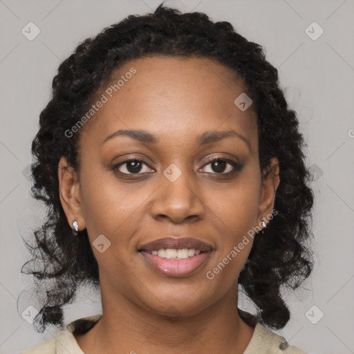 Joyful black young-adult female with medium  brown hair and brown eyes