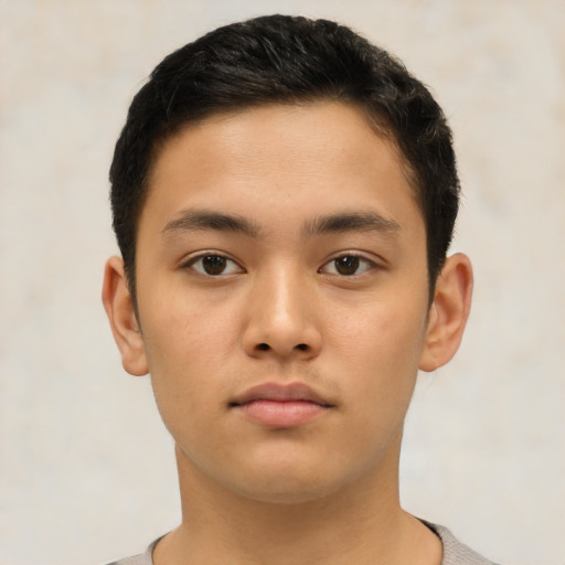 Neutral latino child male with short  brown hair and brown eyes