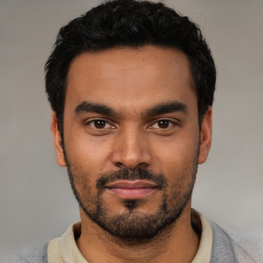 Neutral latino young-adult male with short  black hair and brown eyes