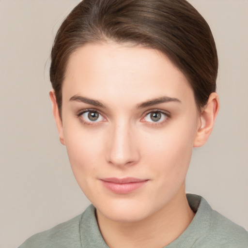 Neutral white young-adult female with short  brown hair and brown eyes