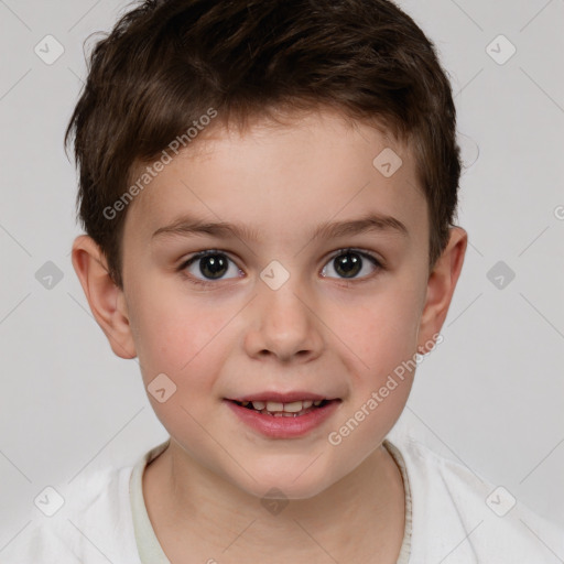 Joyful white child male with short  brown hair and brown eyes