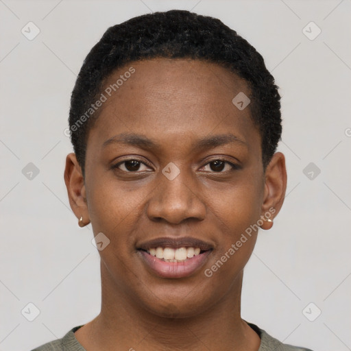 Joyful black young-adult female with short  black hair and brown eyes