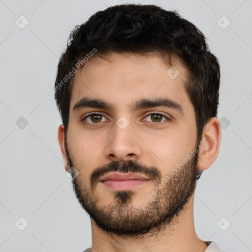 Neutral latino young-adult male with short  black hair and brown eyes