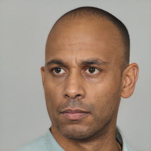 Neutral black adult male with short  brown hair and brown eyes