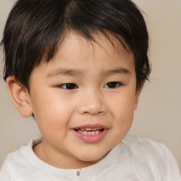 Joyful white child male with short  brown hair and brown eyes