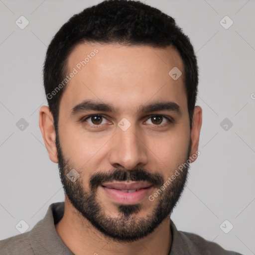 Joyful white young-adult male with short  black hair and brown eyes