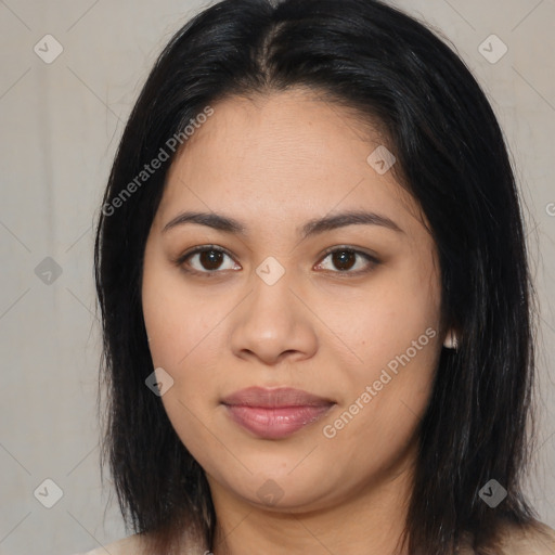 Joyful latino young-adult female with medium  black hair and brown eyes