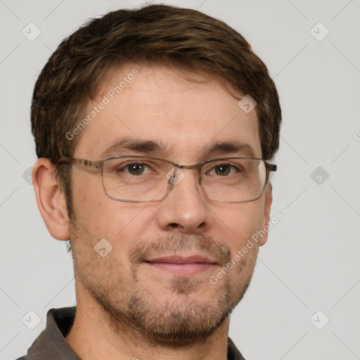 Joyful white adult male with short  brown hair and grey eyes