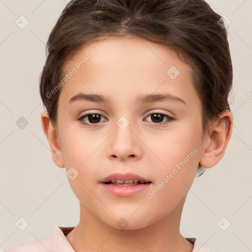 Joyful white child female with short  brown hair and brown eyes