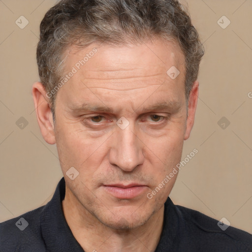 Neutral white middle-aged male with short  brown hair and brown eyes