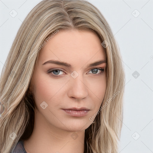 Neutral white young-adult female with long  brown hair and brown eyes