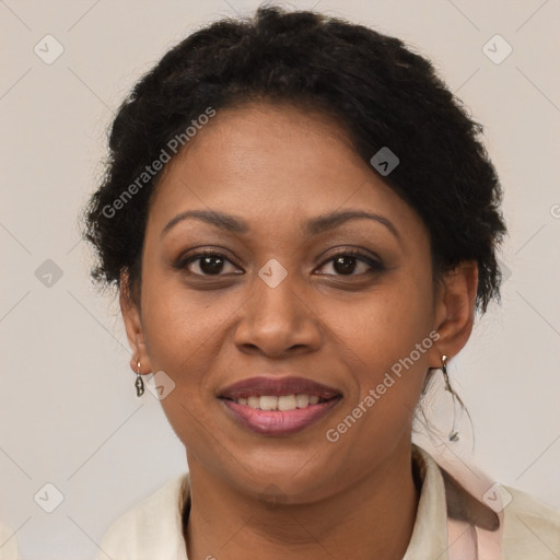 Joyful latino adult female with short  brown hair and brown eyes