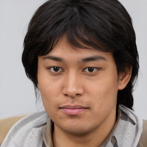 Neutral asian young-adult female with medium  brown hair and brown eyes