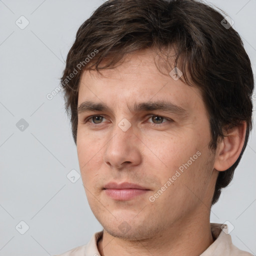 Neutral white adult male with short  brown hair and brown eyes