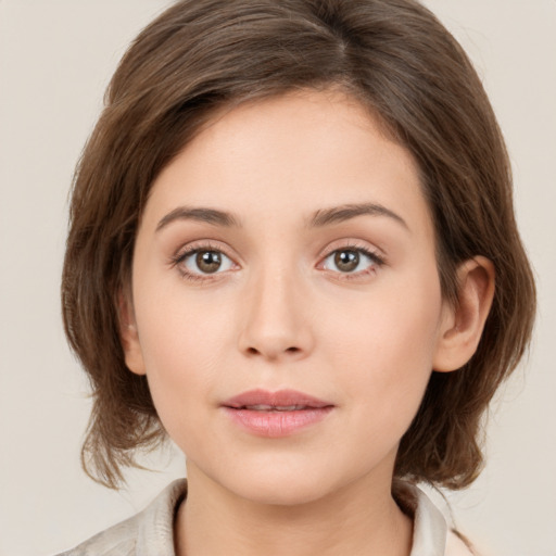 Neutral white young-adult female with medium  brown hair and brown eyes