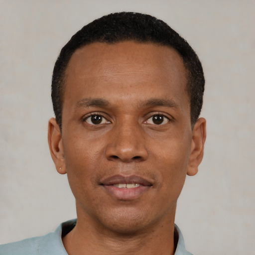 Neutral black young-adult male with short  black hair and brown eyes