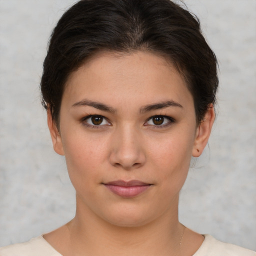 Neutral white young-adult female with short  brown hair and brown eyes