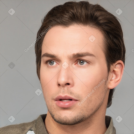 Neutral white young-adult male with short  brown hair and brown eyes