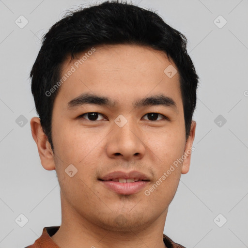 Joyful asian young-adult male with short  black hair and brown eyes