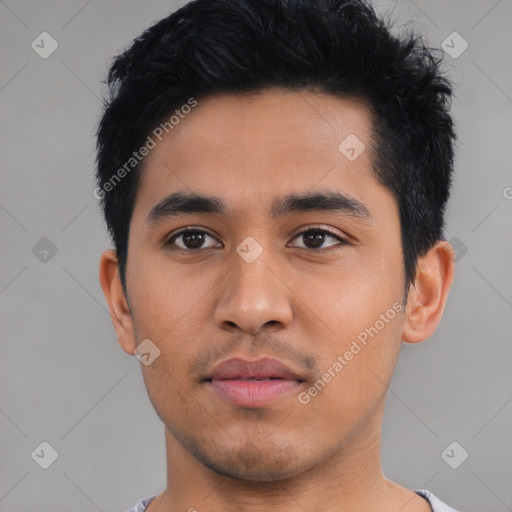 Neutral latino young-adult male with short  black hair and brown eyes