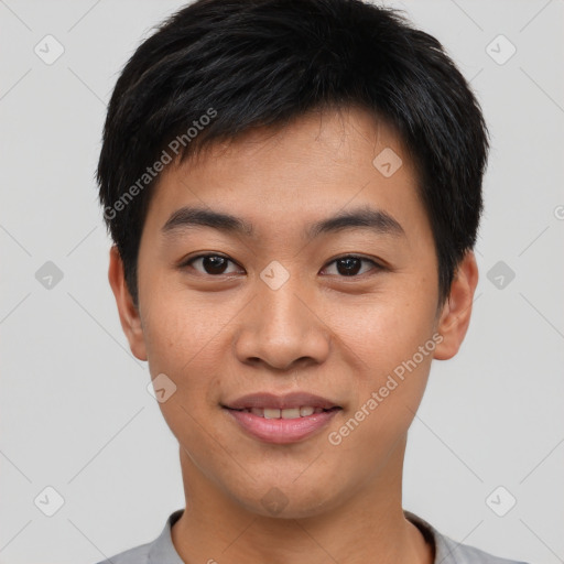 Joyful asian young-adult male with short  black hair and brown eyes