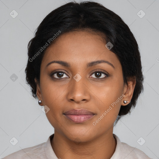 Joyful black young-adult female with medium  black hair and brown eyes