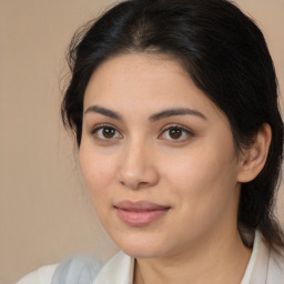 Joyful latino young-adult female with medium  brown hair and brown eyes