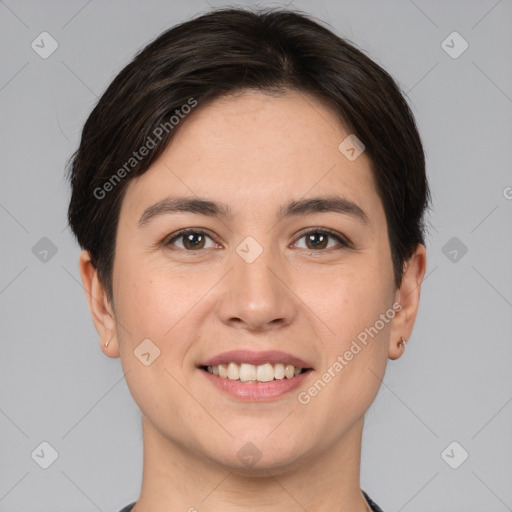 Joyful white young-adult female with short  brown hair and brown eyes