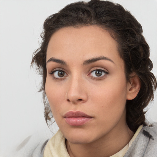 Neutral white young-adult female with medium  brown hair and brown eyes