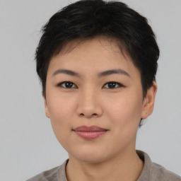 Joyful asian young-adult female with short  brown hair and brown eyes