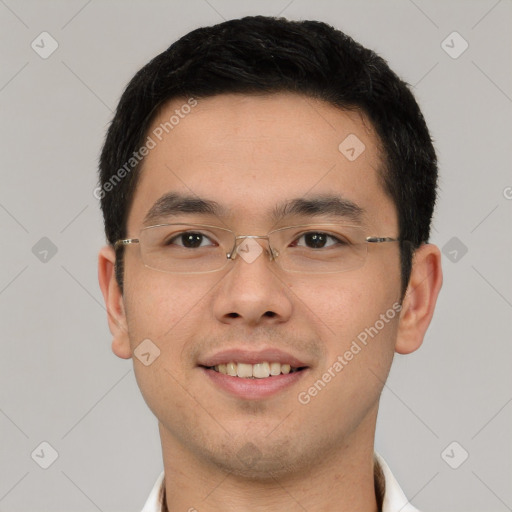 Joyful asian young-adult male with short  brown hair and brown eyes