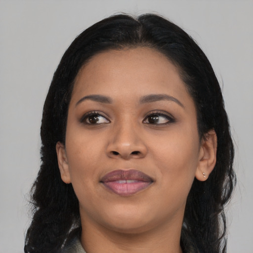 Joyful asian young-adult female with long  black hair and brown eyes