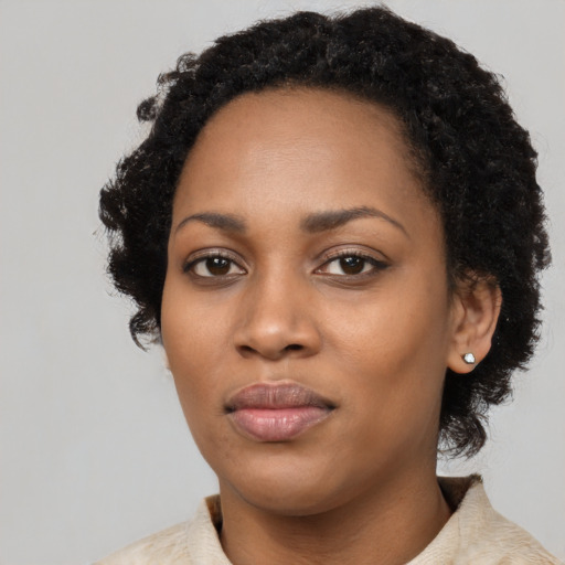 Neutral black young-adult female with long  black hair and brown eyes