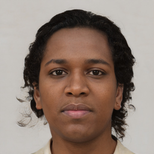 Neutral black young-adult female with short  brown hair and brown eyes
