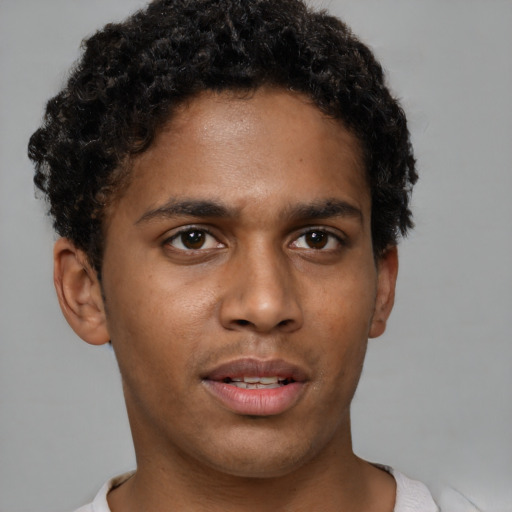 Neutral black young-adult male with short  brown hair and brown eyes