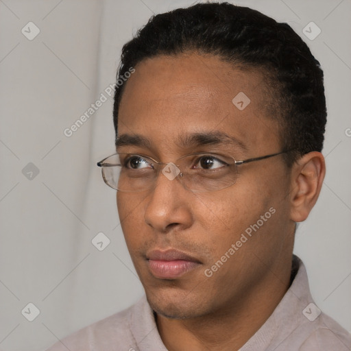 Neutral black young-adult male with short  black hair and brown eyes