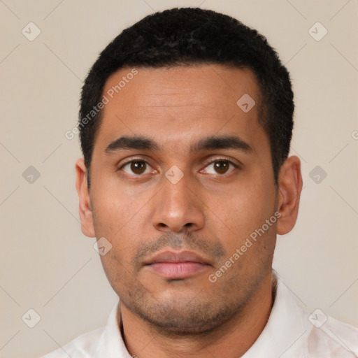 Neutral latino young-adult male with short  black hair and brown eyes