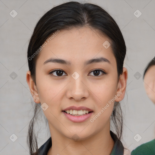 Joyful asian young-adult female with medium  brown hair and brown eyes