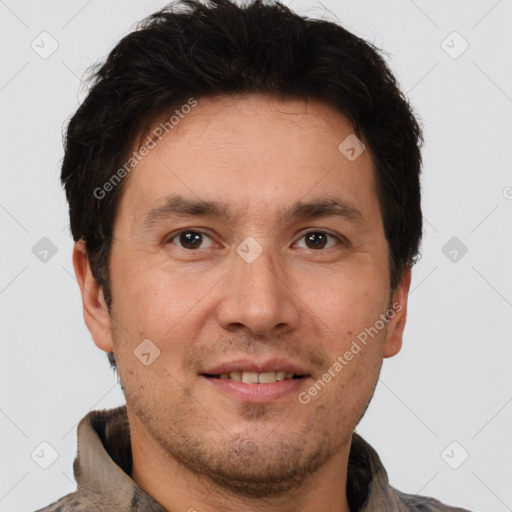 Joyful white adult male with short  brown hair and brown eyes