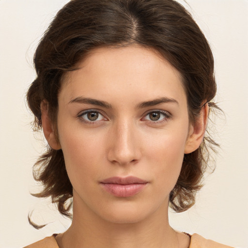 Neutral white young-adult female with medium  brown hair and brown eyes