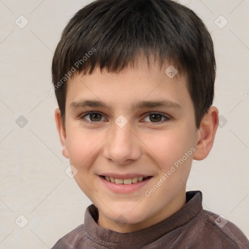 Joyful white child male with short  brown hair and brown eyes