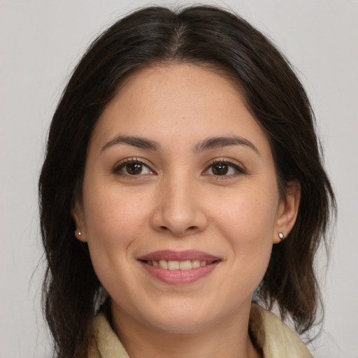 Joyful white young-adult female with medium  brown hair and brown eyes