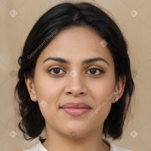 Joyful latino young-adult female with long  brown hair and brown eyes